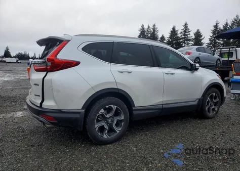 2019 Honda Cr-V Touring z USA, uszkodzony, nr VIN 7FARW2H92KE039976